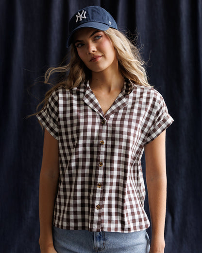 Downeast In Check Top featuring a stylish plaid pattern, long sleeves, and a relaxed fit ideal for casual wear.