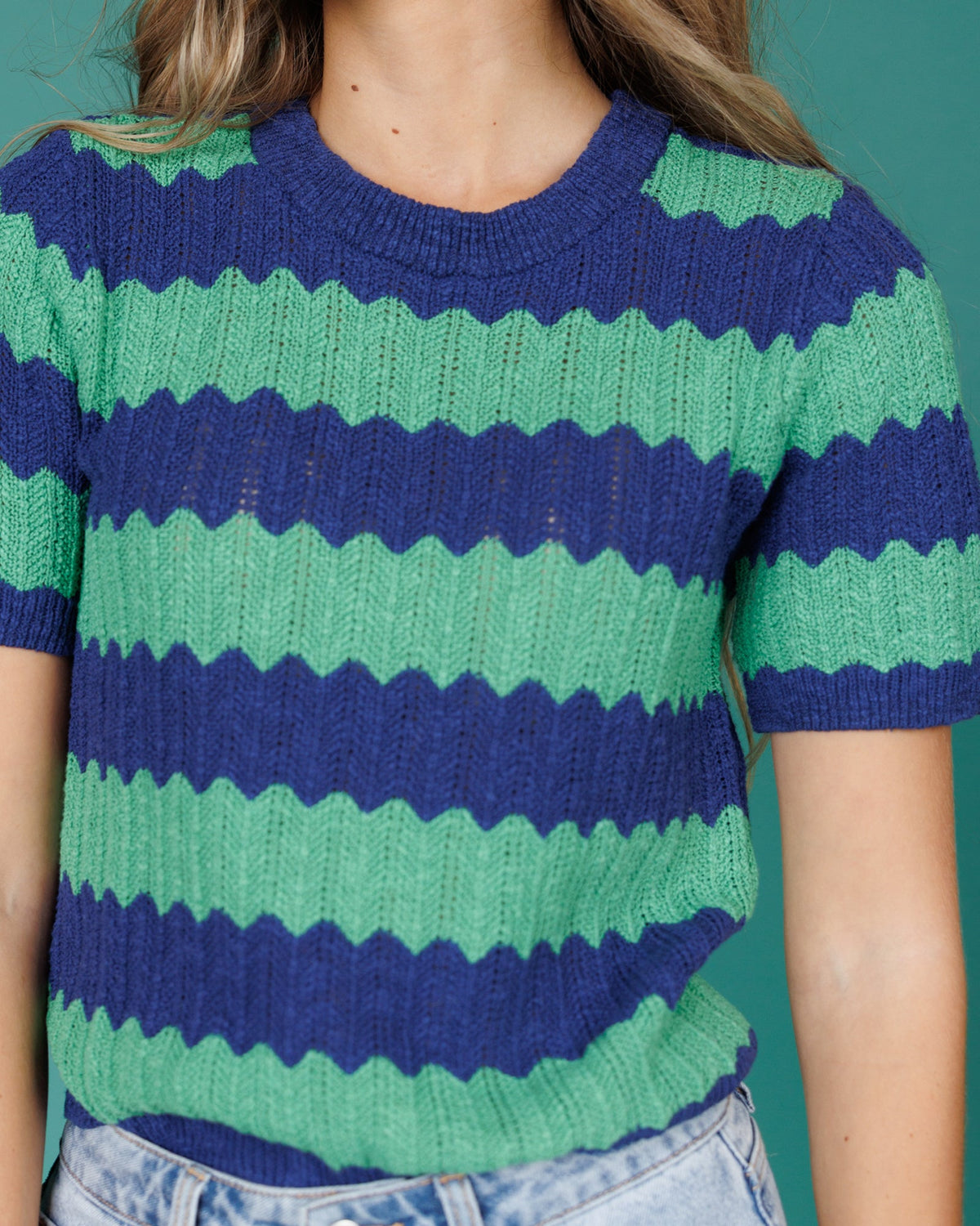 Downeast Tropez Sweater in neutral color, featuring a cozy knit design and ribbed cuffs, perfect for casual wear.