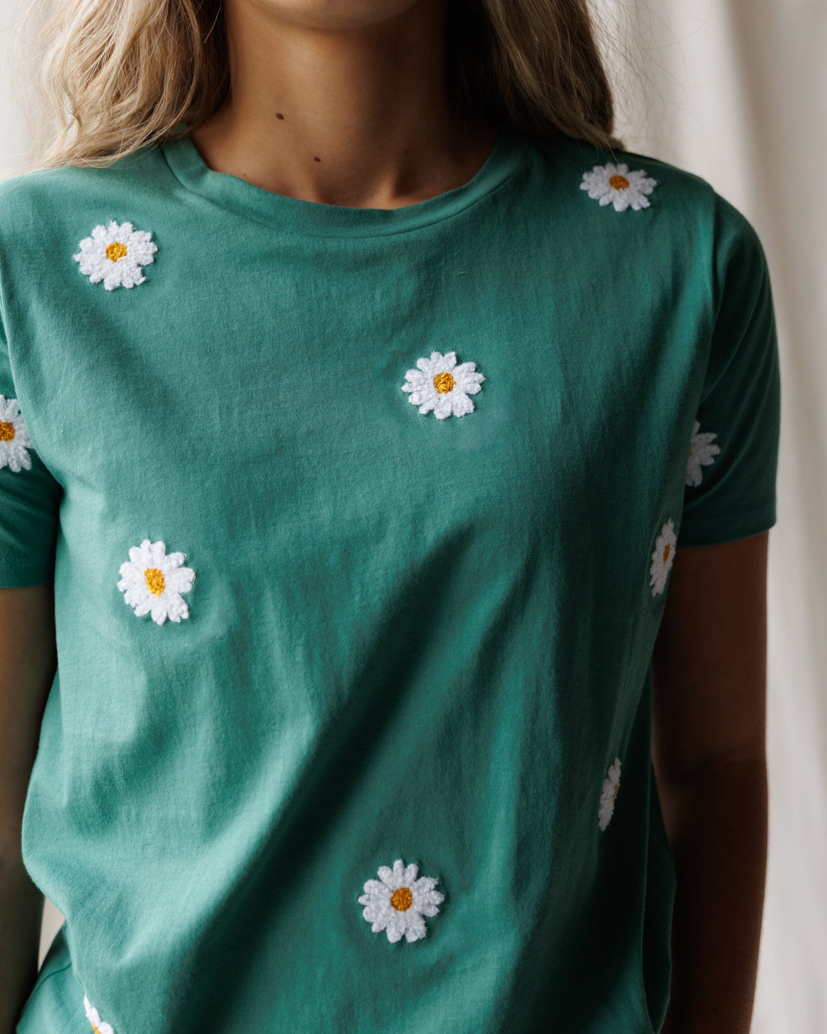 Downeast Pretty Petals Tee, casual women's top with floral pattern, soft fabric, and comfortable fit, shown in a front view.