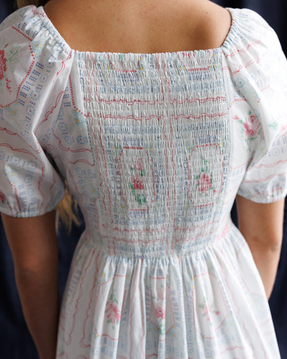 Downeast cross stitch crochet dress, a stylish women's dress with intricate detailing and a comfortable fit.