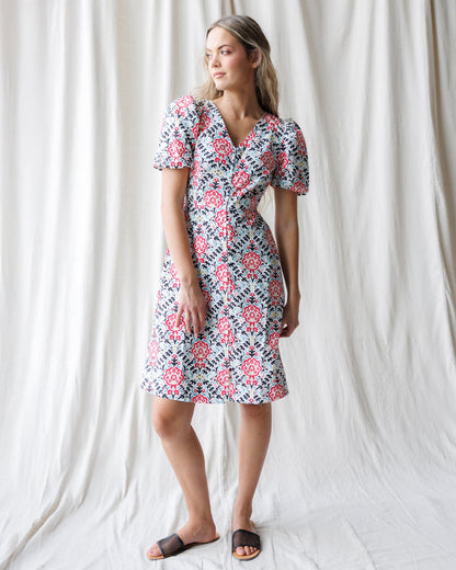 Downeast Capri dress displayed on a hanger, showcasing its lightweight fabric and casual summer style.