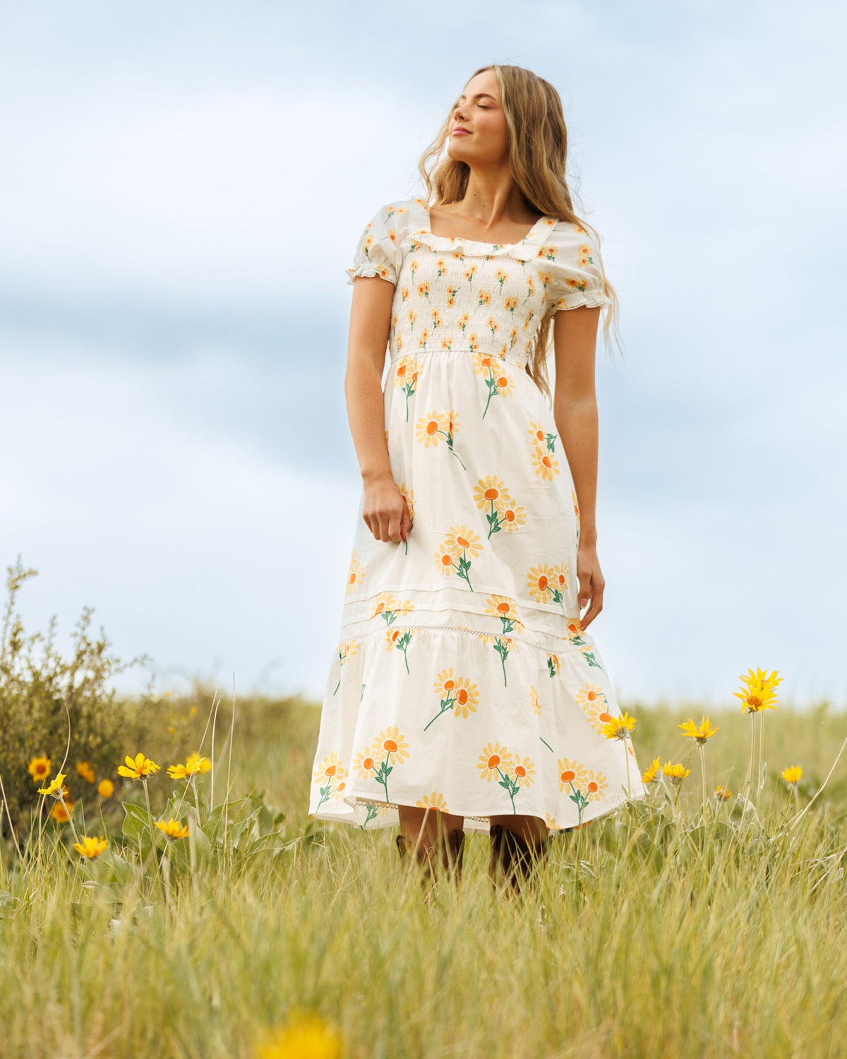 Downeast Arboretum Dress shown on a model, featuring a floral print, lightweight fabric, and a relaxed fit for casual wear.