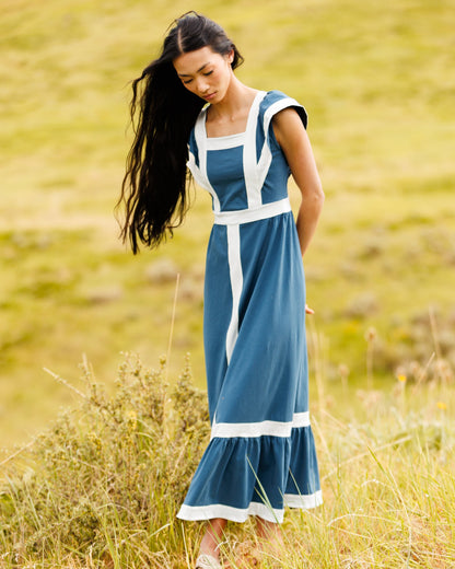 Downeast Block Party Dress, stylish women's dress with vibrant pattern, sleeveless design, and knee-length fit.