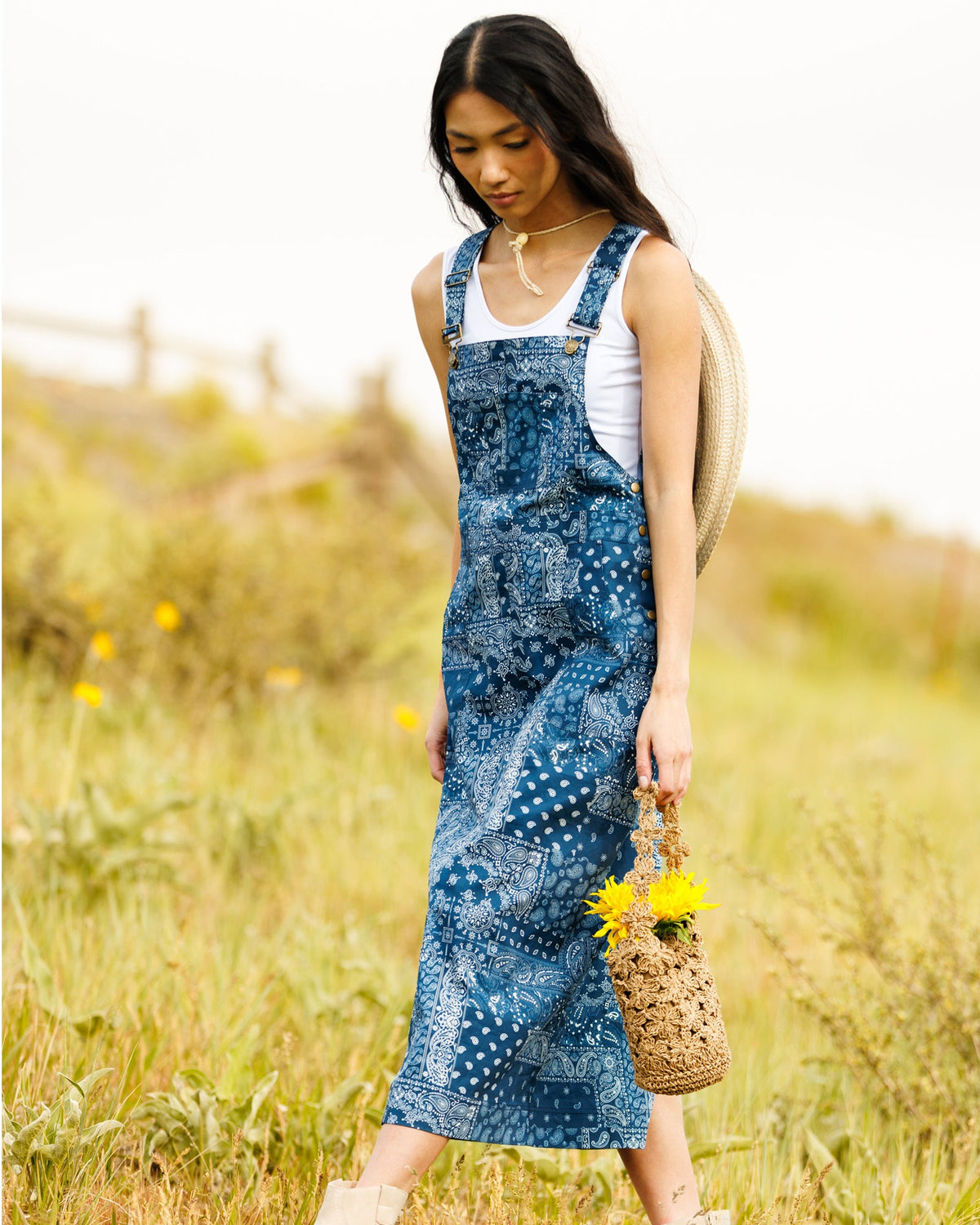 Downeast OOTD overalls dress, casual style with adjustable straps and front pockets, shown on a model.