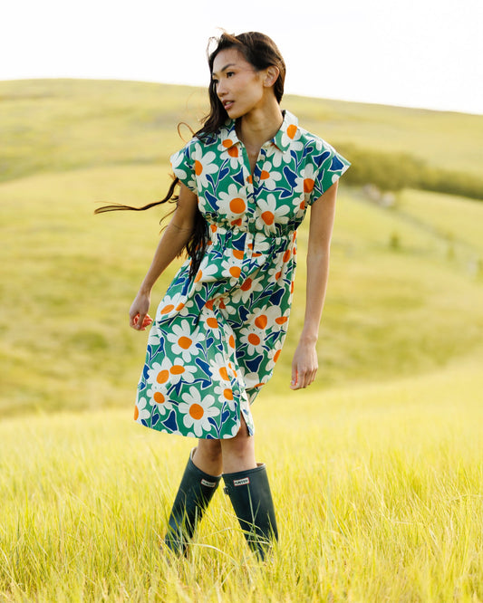 Downeast Newberry Dress in soft fabric with a fitted bodice and flowing skirt, displayed on a hanger against a neutral background.