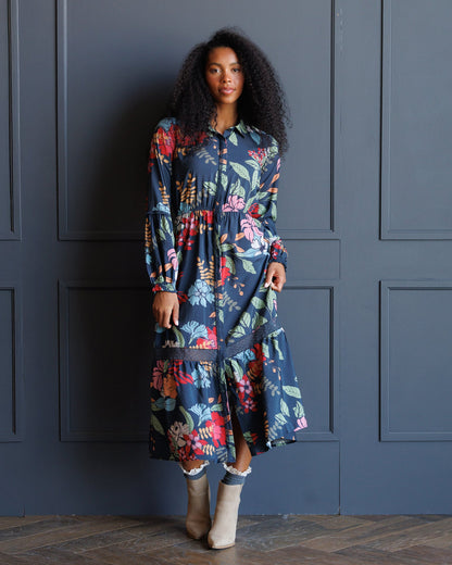 Downeast Wheatland Maxi Dress in flowing fabric with a fitted bodice and full-length skirt, perfect for casual or semi-formal wear.