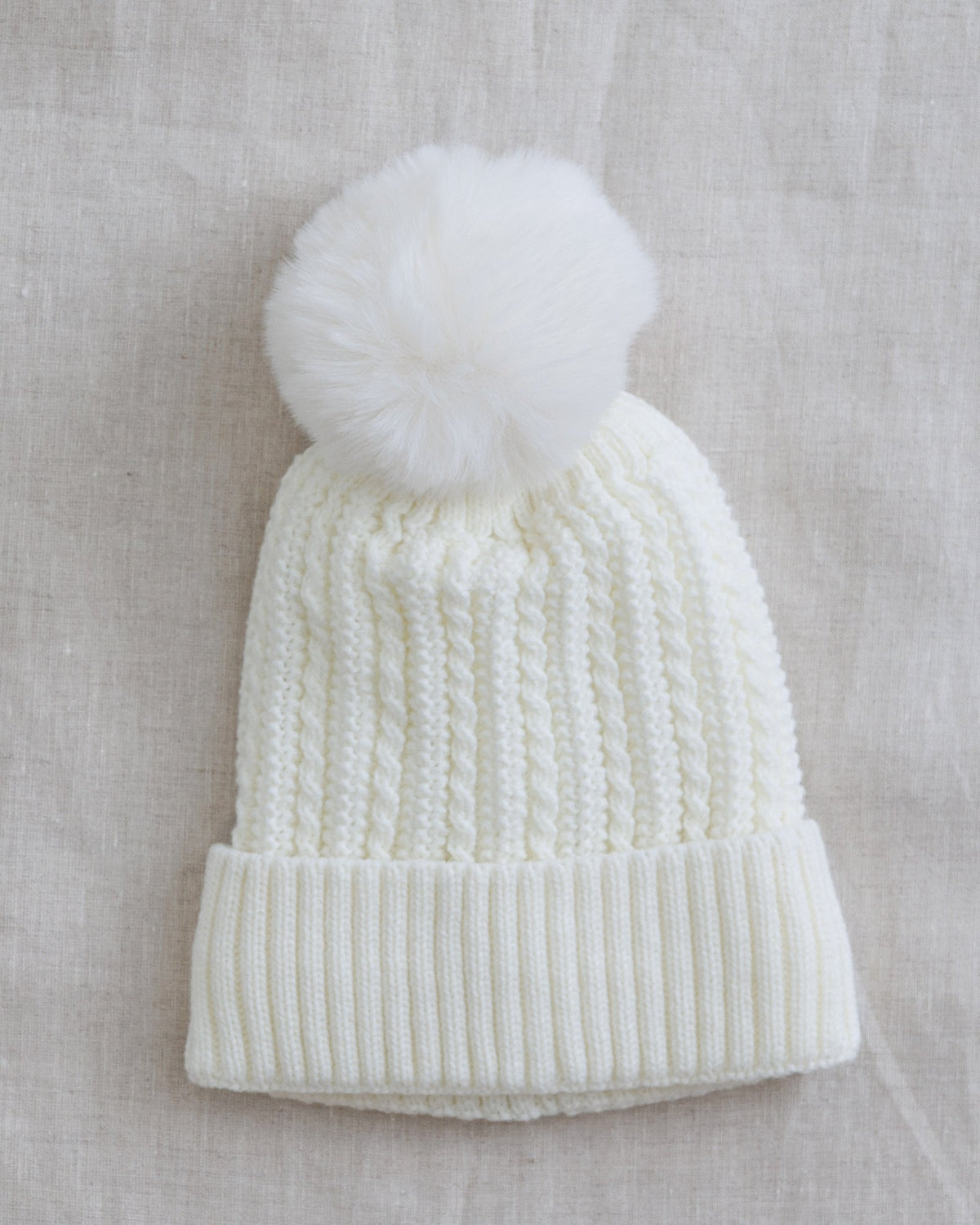Downeast Frost Beanie hat in cozy knit fabric, featuring a ribbed design and folded brim for warmth and style.
