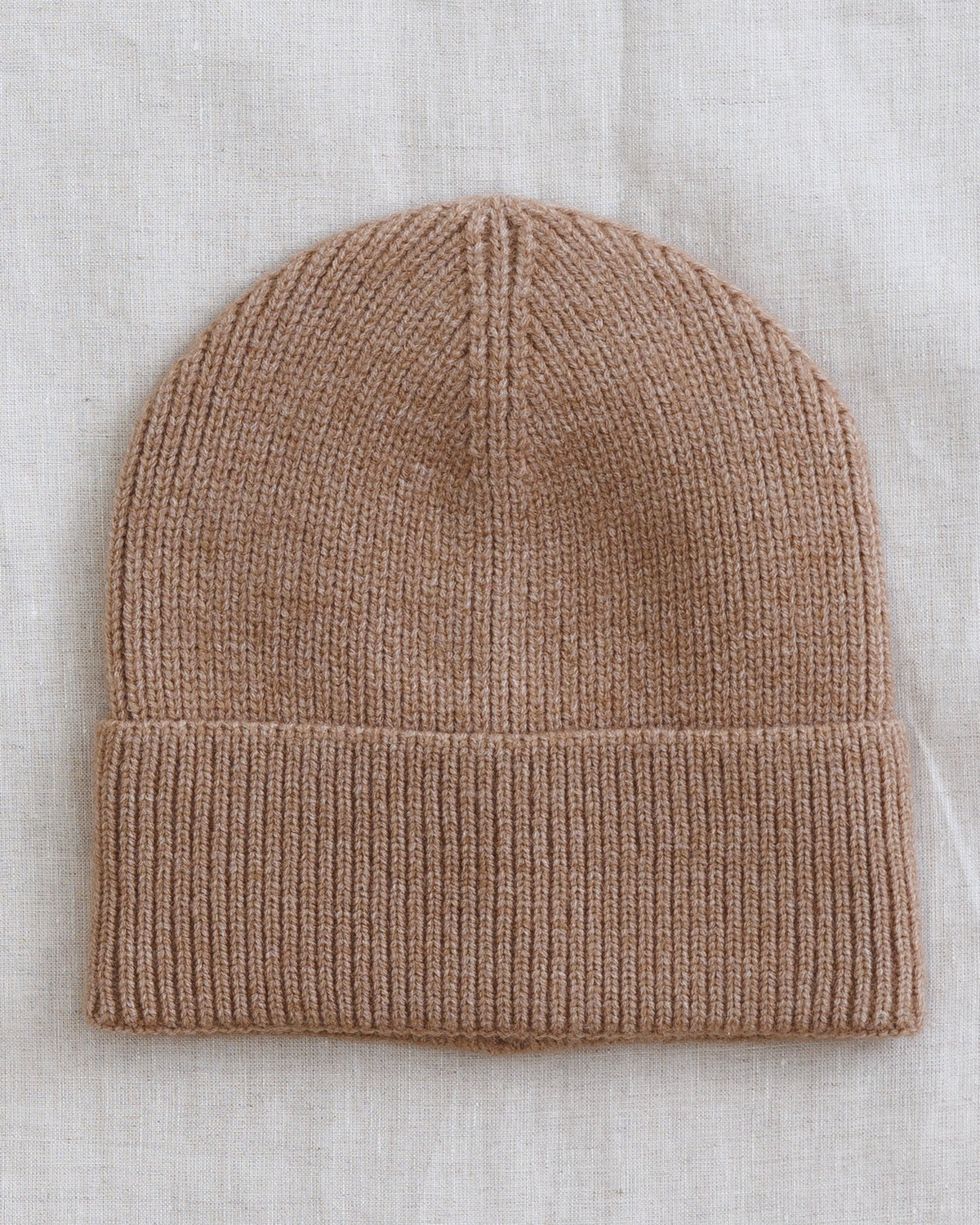 Downeast Alpine Beanie hat in cozy knit with a folded brim, perfect for cold weather and winter style.