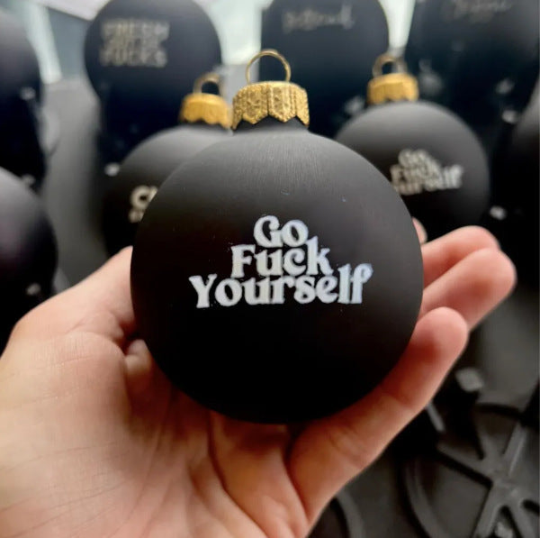 Funny Christmas ornament black decoration hanging on a tree
