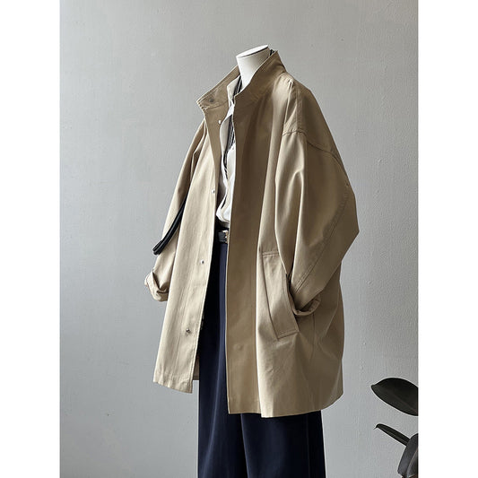 Japanese style women’s workwear trench coat with stand collar and structured silhouette