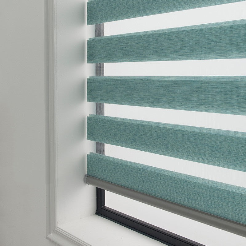 Soft gauze electric zebra rolling curtain in semi-shading fabric, shown in a modern window setting