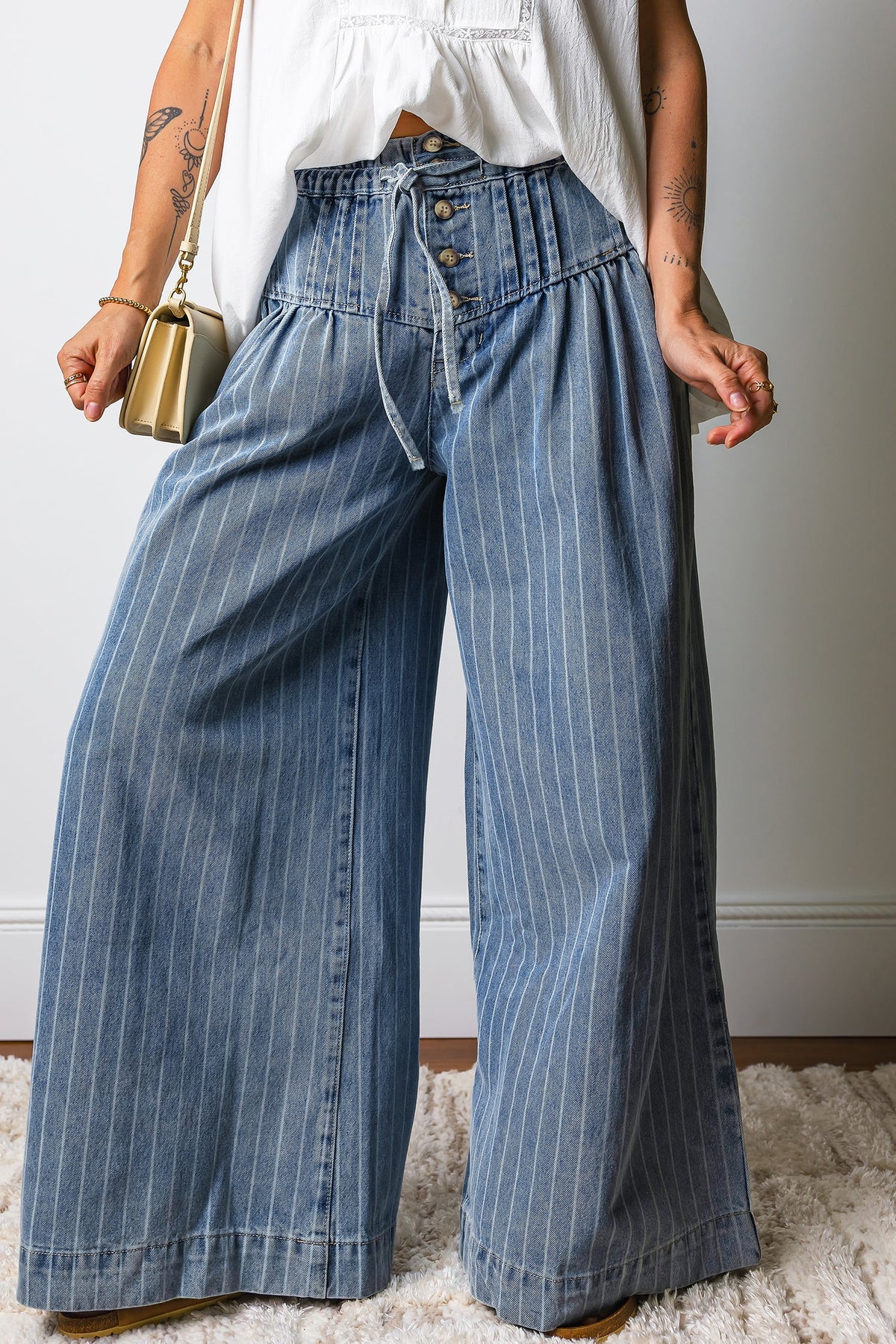Light blue Sutton Casual Wide Leg Jeans by Threaded Pear with a relaxed fit and classic denim style.