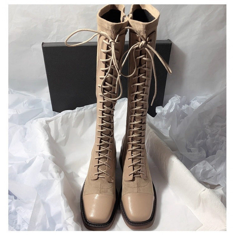Stitched round-toe lace-up high-top women’s boots in a classic ankle-high design