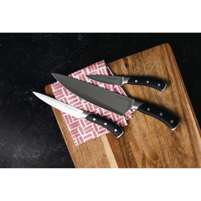 Dura Living Elite 3-piece black kitchen knife set with stainless steel blades and black handles on a cutting board.