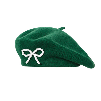 Pearl bow wool breathable beret in soft neutral fabric, featuring a decorative pearl-accented bow on the side