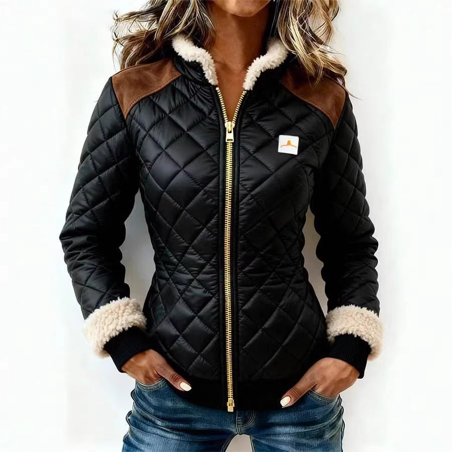 Women's quilted jacket with fur trim and front zipper coat in a close-up product view