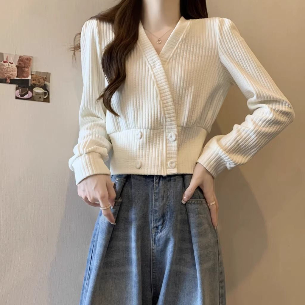 Dropped-shoulder women's fitted base layer sweater top in a simple close-fitting design