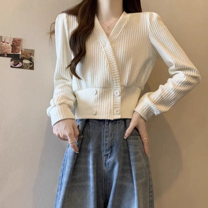 Dropped-shoulder women's fitted base layer sweater top in a simple close-fitting design