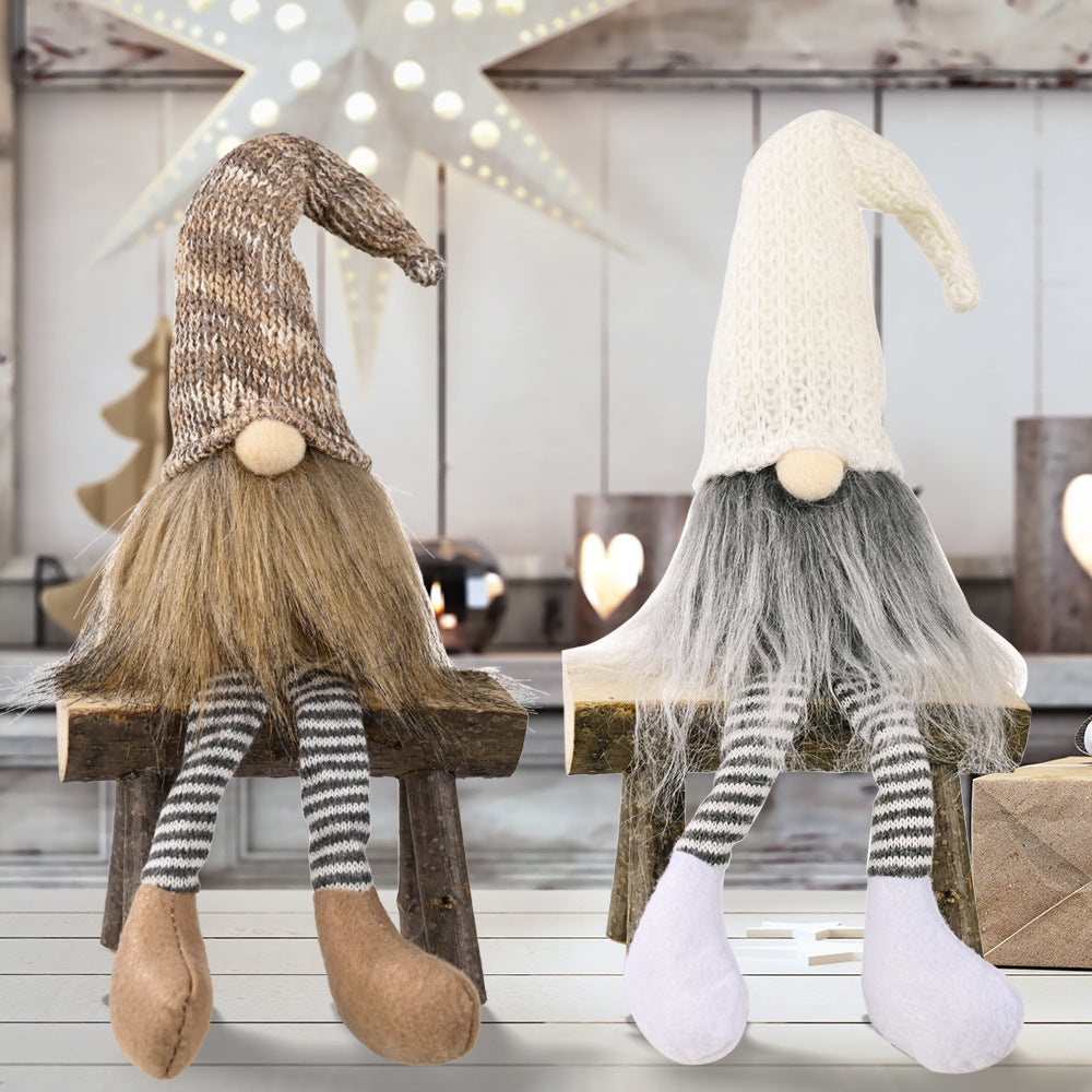 Christmas decorations faceless doll with festive holiday outfit and decorative accents