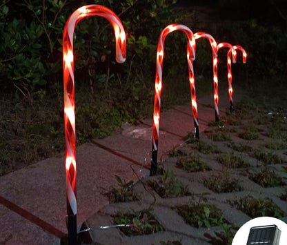 Solar powered cane string lights for Christmas home decor, featuring a warm white glow along natural cane stems