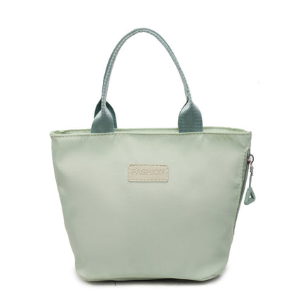 Women's casual fabric tote handbag, versatile commuter shoulder bag in a fashionable design