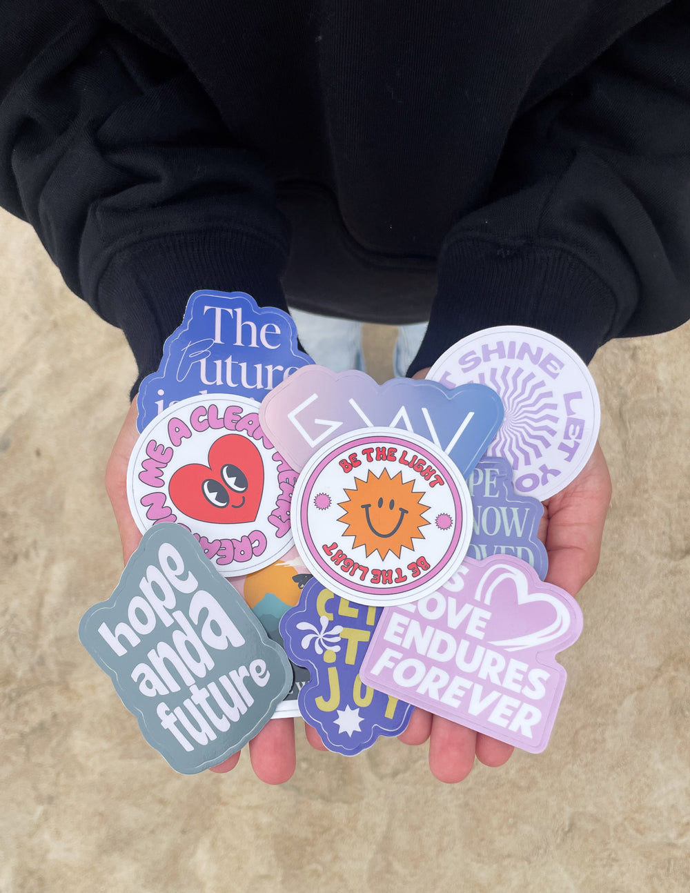 Set of 10 random stickers from Elevated Faith featuring diverse designs and vibrant colors on a white background.