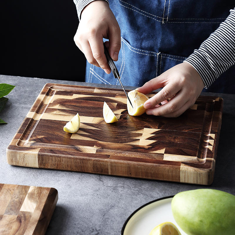 Solid wood parquet cutting board for kitchen household use, featuring a decorative wood-grain pattern