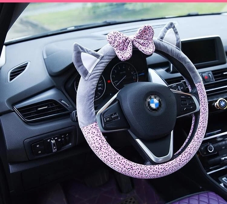 Cute cat ear steering wheel cover in soft short plush fabric, shown from the front