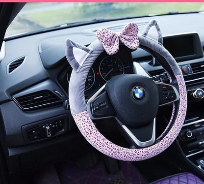 Cute cat ear steering wheel cover in soft short plush fabric, shown from the front