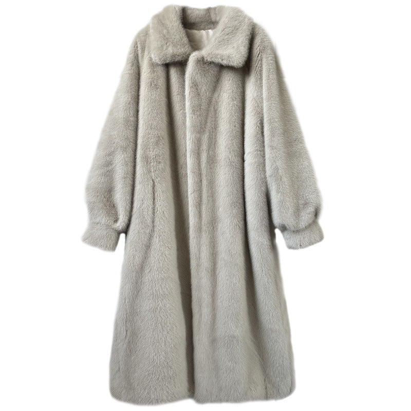 Women's winter extended fashion leather fur coat with a warm fur-trimmed design