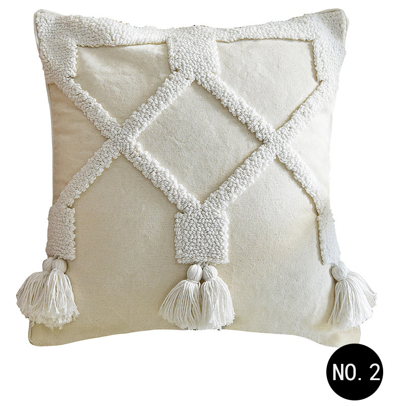 Nordic Moroccan tufted throw pillow with a simple textured pillowcase in a neutral design