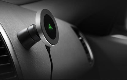 Car magnetic wireless charger by My Store mounted in a vehicle interior with phone charging wirelessly