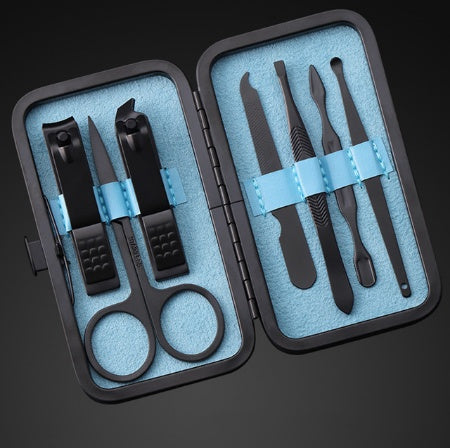 7-piece nail manicure set with nail clippers, knife, and eyebrow tools