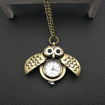 Owl pocket watch with detailed owl design on the case