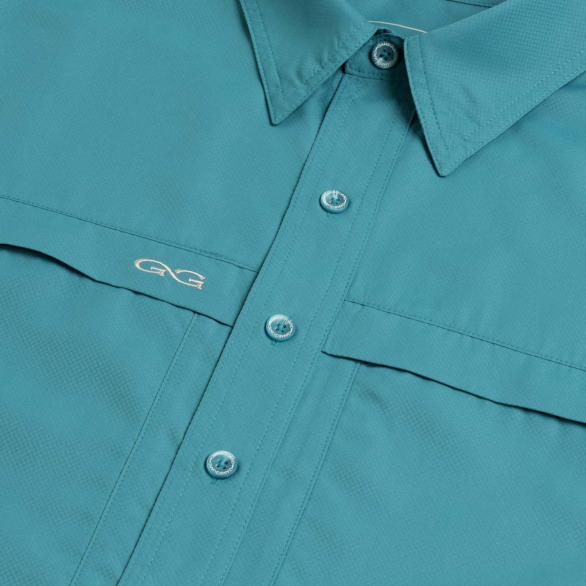 Mahi Original Shirt by GameGuard, featuring a casual design with a comfortable fit and stylish pattern, displayed on a hanger.