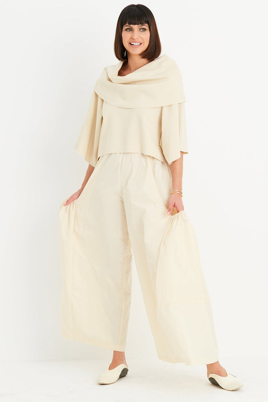 PLANET by Lauren G Scuba Jackie O Top in butter color, close-up of the fitted top with scoop neckline and smooth fabric.
