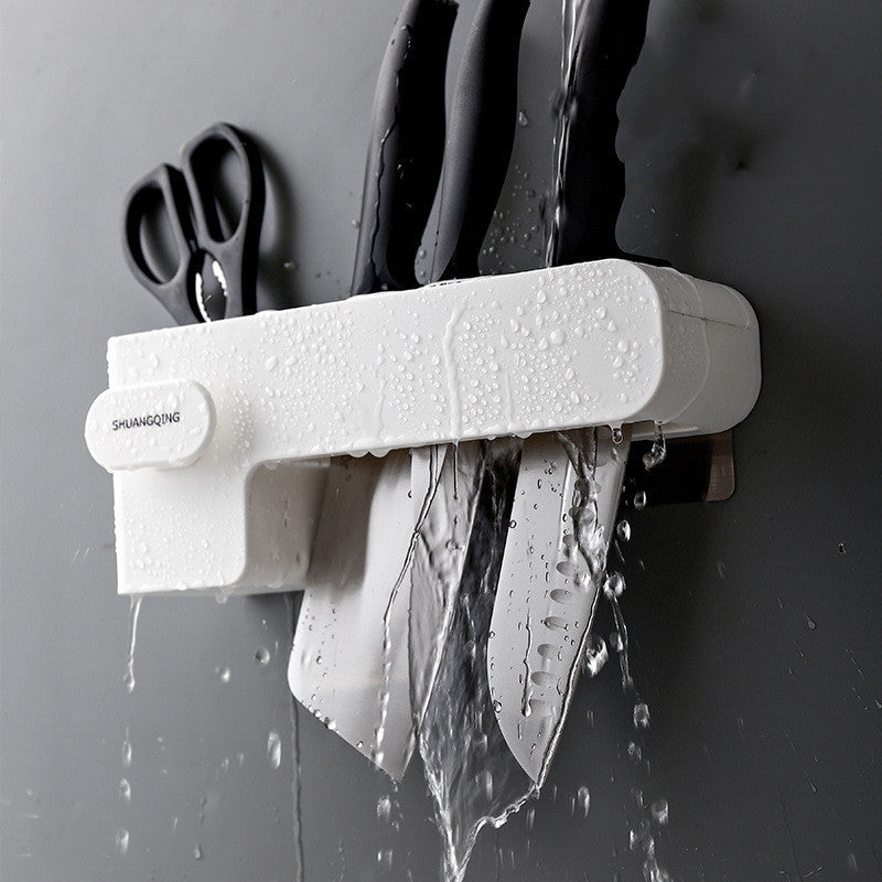 Kitchen knife rack for organizing kitchen supplies, shown in a compact countertop design
