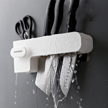 Kitchen knife rack for organizing kitchen supplies, shown in a compact countertop design