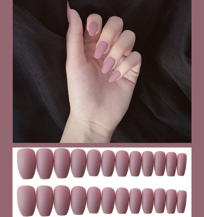Frosted ballet fake nails with soft pink finish and elegant ballet-inspired design