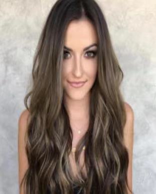 Ladies big wavy long curly hair wig, front view with voluminous waves and defined curls