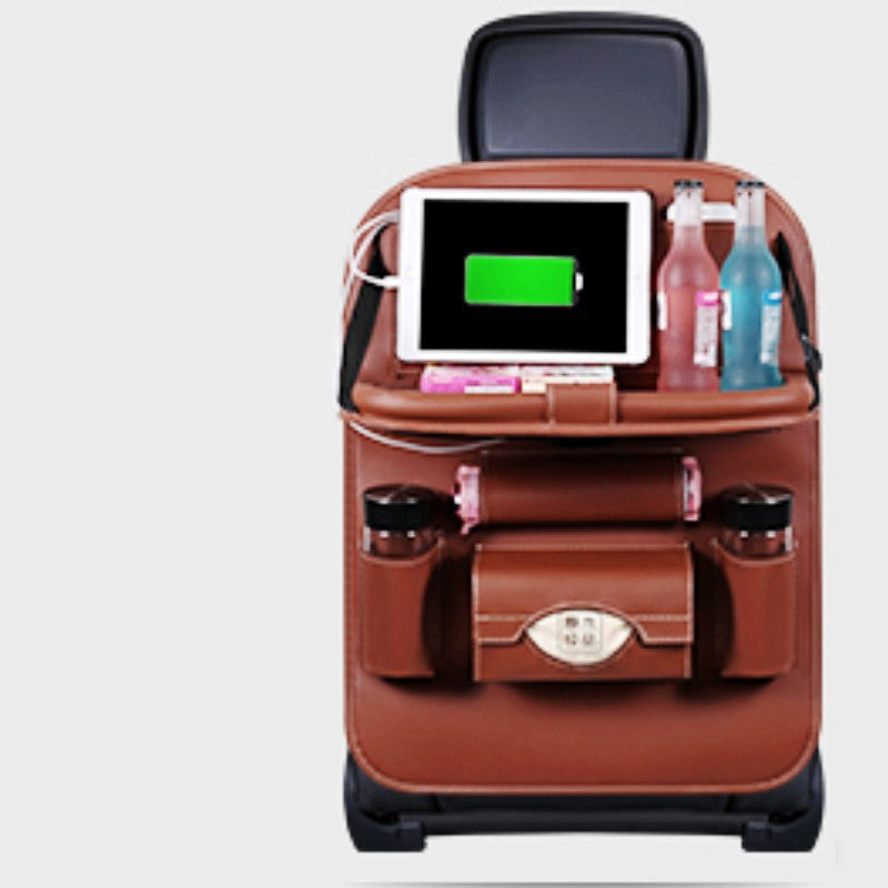 Charging car storage bag hanging from vehicle seatback with multiple compartments and cable organization pockets