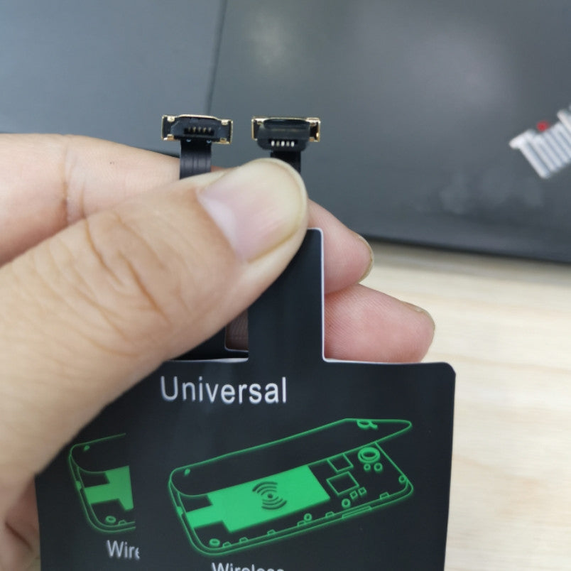 Wireless charger receiver by My Store for compatible smartphones