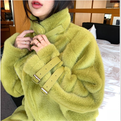 Women's leather coat with buckle closure and fur trim, front view