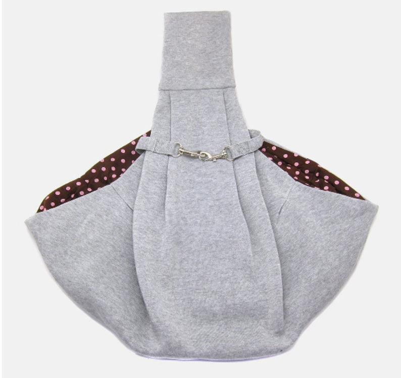Foldable pet shoulder bag for carrying small pets, shown in a compact portable design