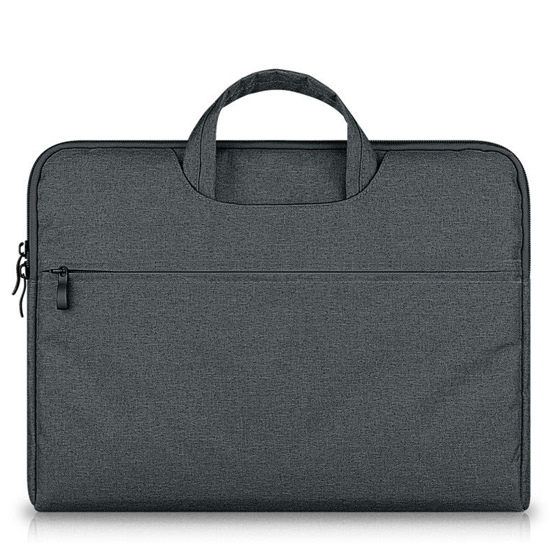 Black laptop bag compatible with Apple laptops, featuring a padded compartment and adjustable shoulder strap
