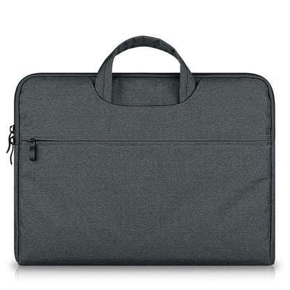Black laptop bag compatible with Apple laptops, featuring a padded compartment and adjustable shoulder strap