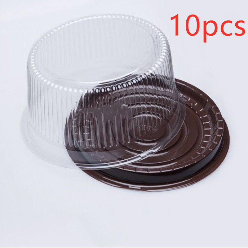 Transparent round blister cake packaging box displayed empty
