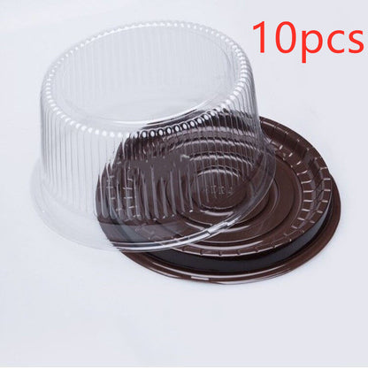 Transparent round blister cake packaging box displayed empty