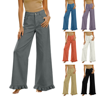 High-waisted cotton-linen wide-leg pants with ruffled hem, shown in a full-length view