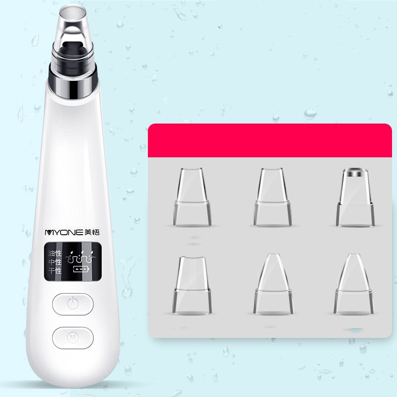 Electric blackhead remover tool in black, handheld skincare device with suction nozzle